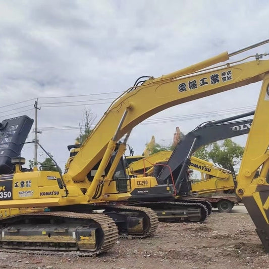 Second-hand large excavators, including Komatsu PC350, PC400, and PC450.