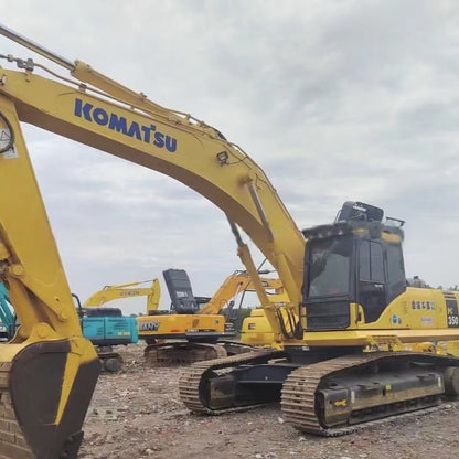 Second-hand large excavators, including Komatsu PC350, PC400, and PC450.