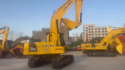 Second-hand large excavators, including Komatsu PC350, PC400, and PC450.