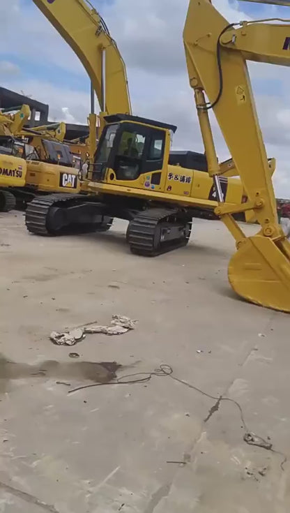 Second-hand large excavators, including Komatsu PC350, PC400, and PC450.